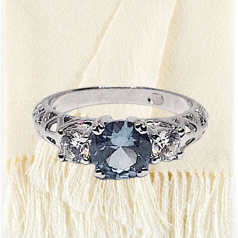 Sterling Silver Ring w/Blue CZ Center Stone & Small Round CZ Stone on Each Side